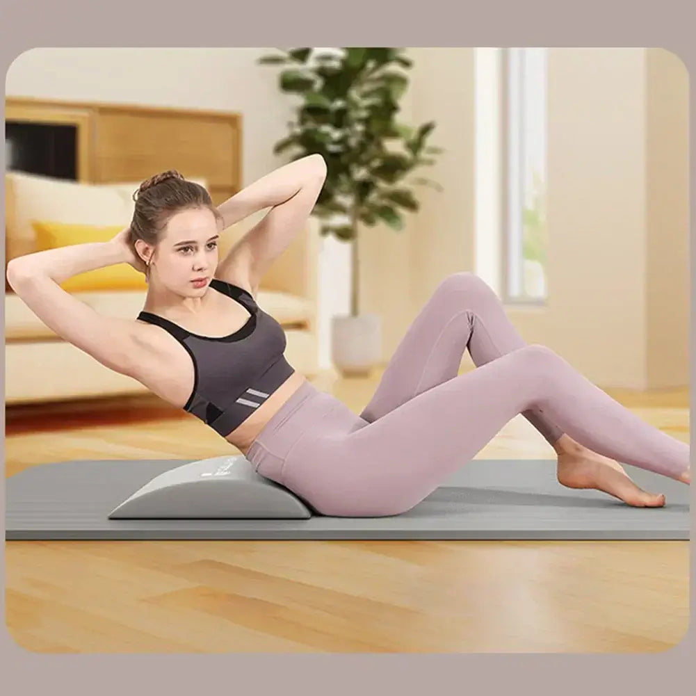 Muscle Training Aid with Suction Cups in use during home workout session on mat.
