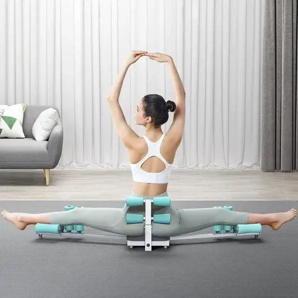Woman using heavy duty leg split stretcher machine for yoga practice on a mat in a modern living room setting.