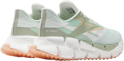 Reebok women's Floatzig running shoes with lightweight design and breathable mesh upper, shown on a clean white background.