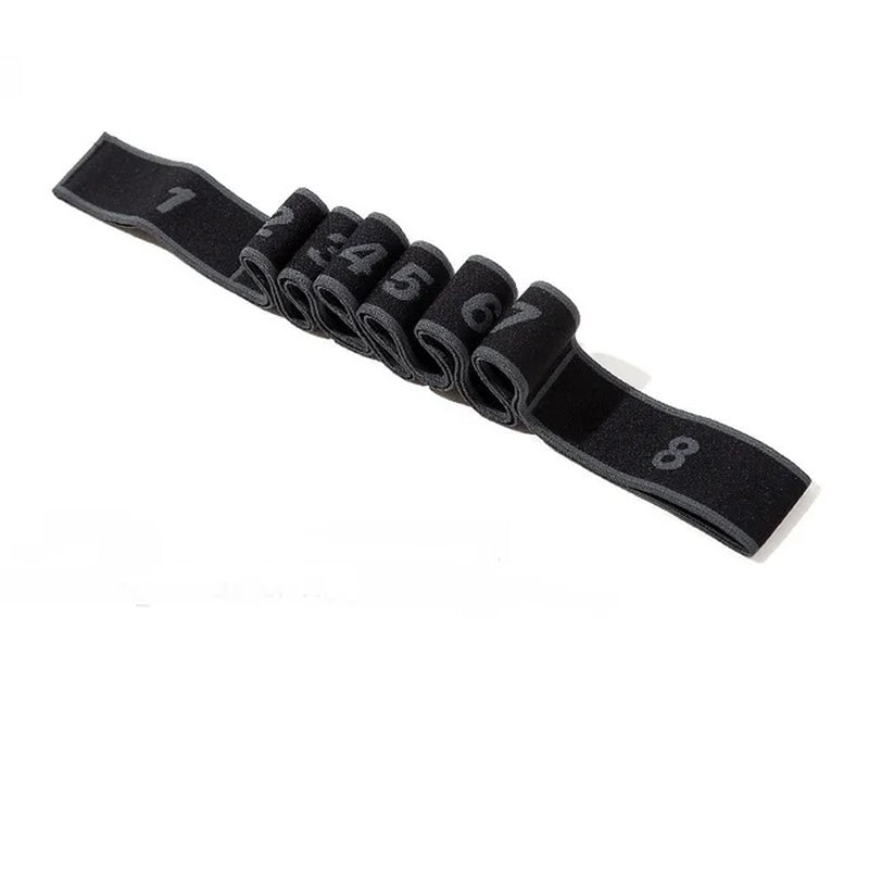 Elastic yoga pull strap belt by Fitness Essentials, used for stretching, Pilates, and fitness exercises in gym and dance routines.