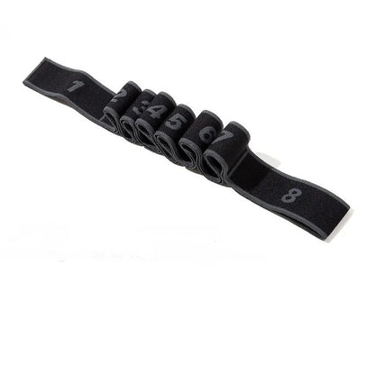 Elastic yoga pull strap belt by Fitness Essentials, used for stretching, Pilates, and fitness exercises in gym and dance routines.