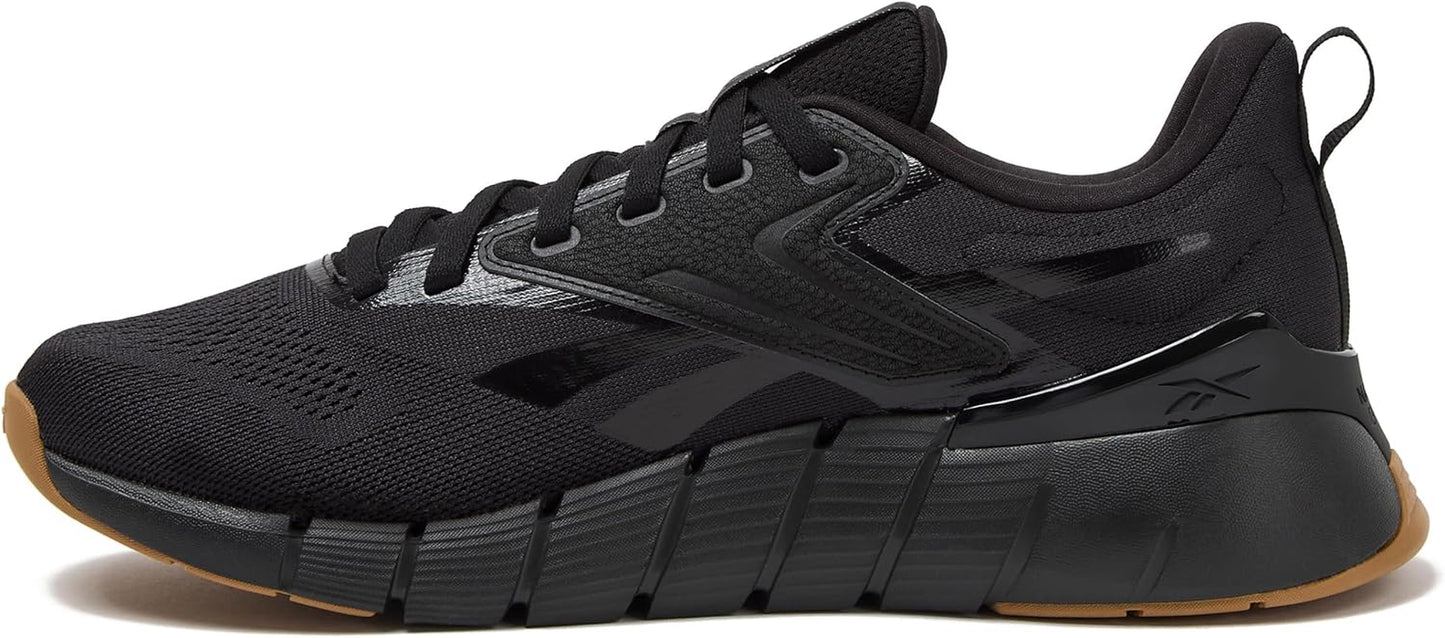 Reebok Nano Gym 1.0 men's athletic workout shoes with black and gray design, featuring supportive sole and breathable upper fabric.