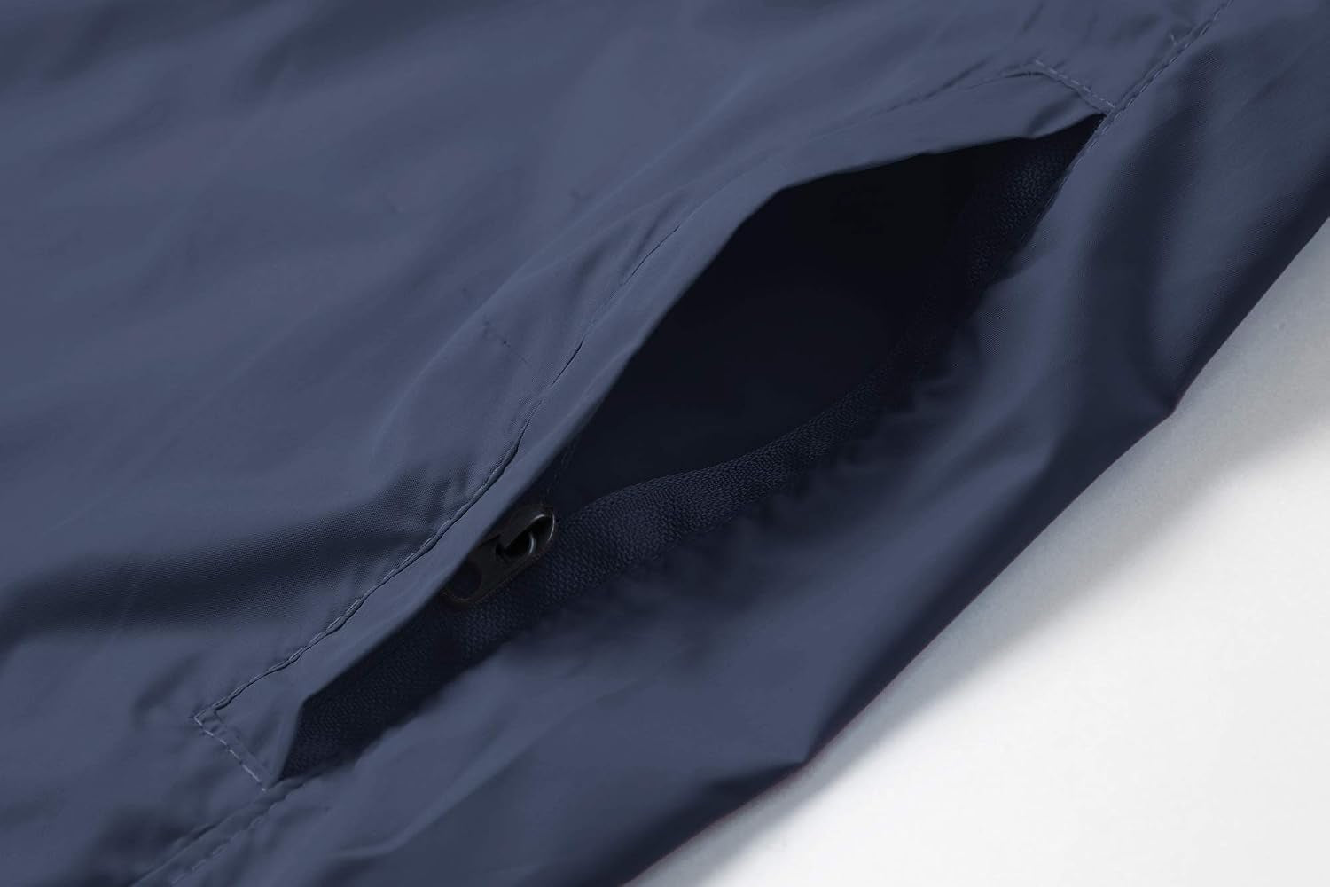 Spmor women's lightweight waterproof windbreaker jacket, packable running coat, shown in a bright, breathable design suitable for outdoor activities.