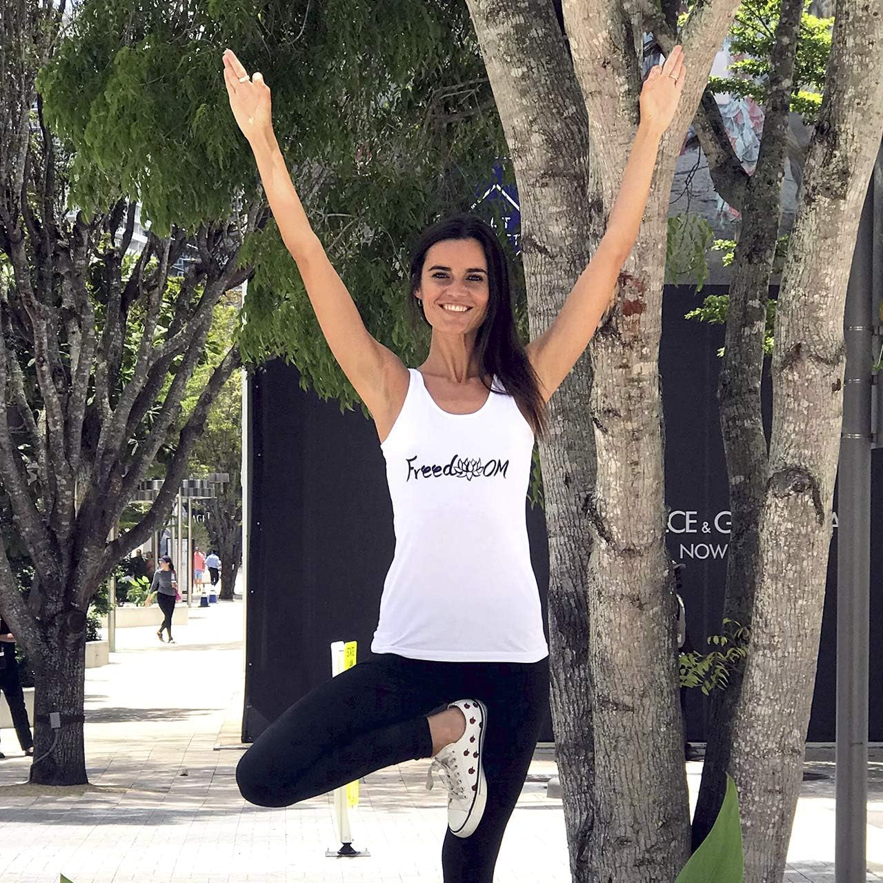 TREELANCE women's organic cotton yoga tank top with yoga print, sleeveless workout shirt for gym, Pilates, and casual wear.