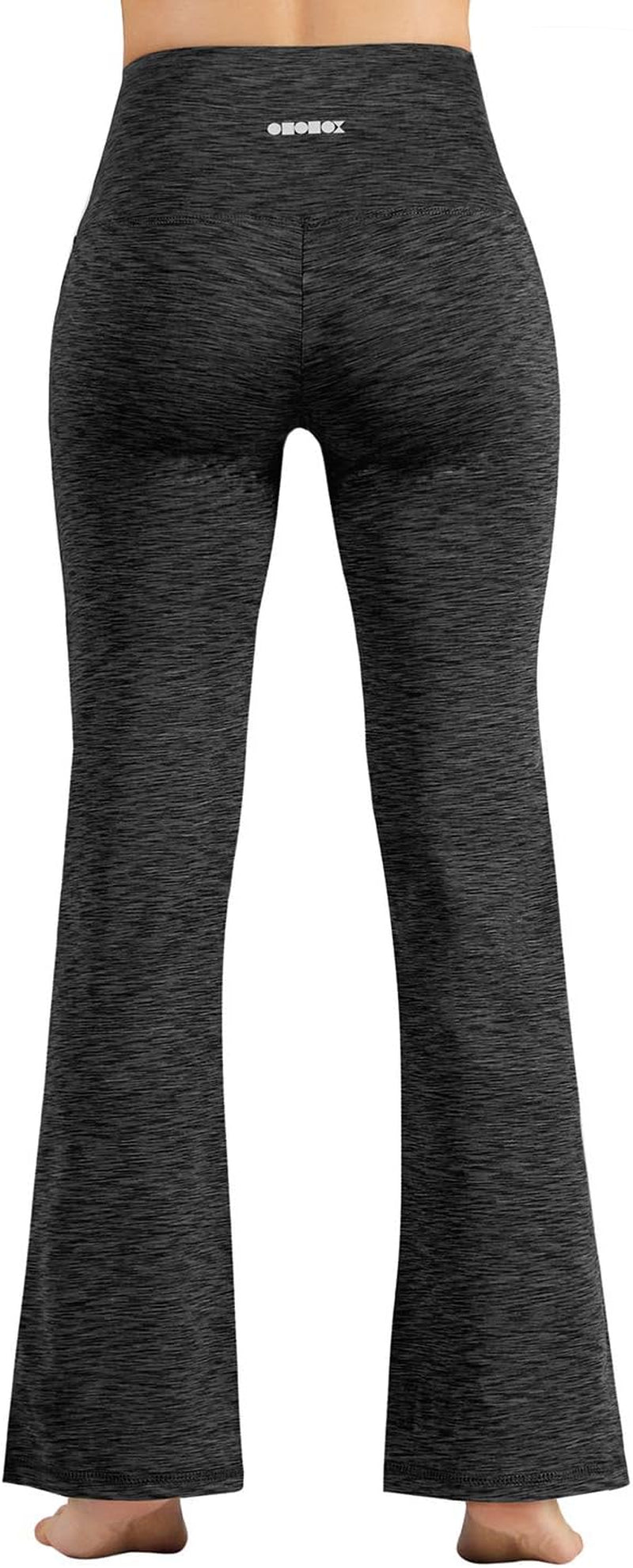 ODODOS women's high-waisted bootcut yoga pants in charcoal with tummy control, inner pocket, and 31-inch inseam, spacedye fabric.