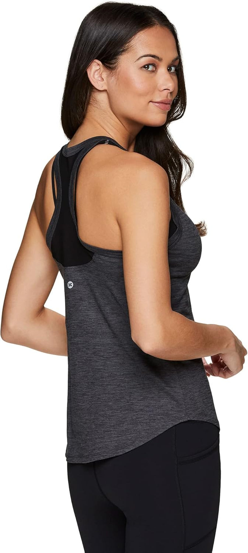 RBX active women's sleeveless athletic tank top with mesh ventilation, ideal for running, workout, and yoga activities.