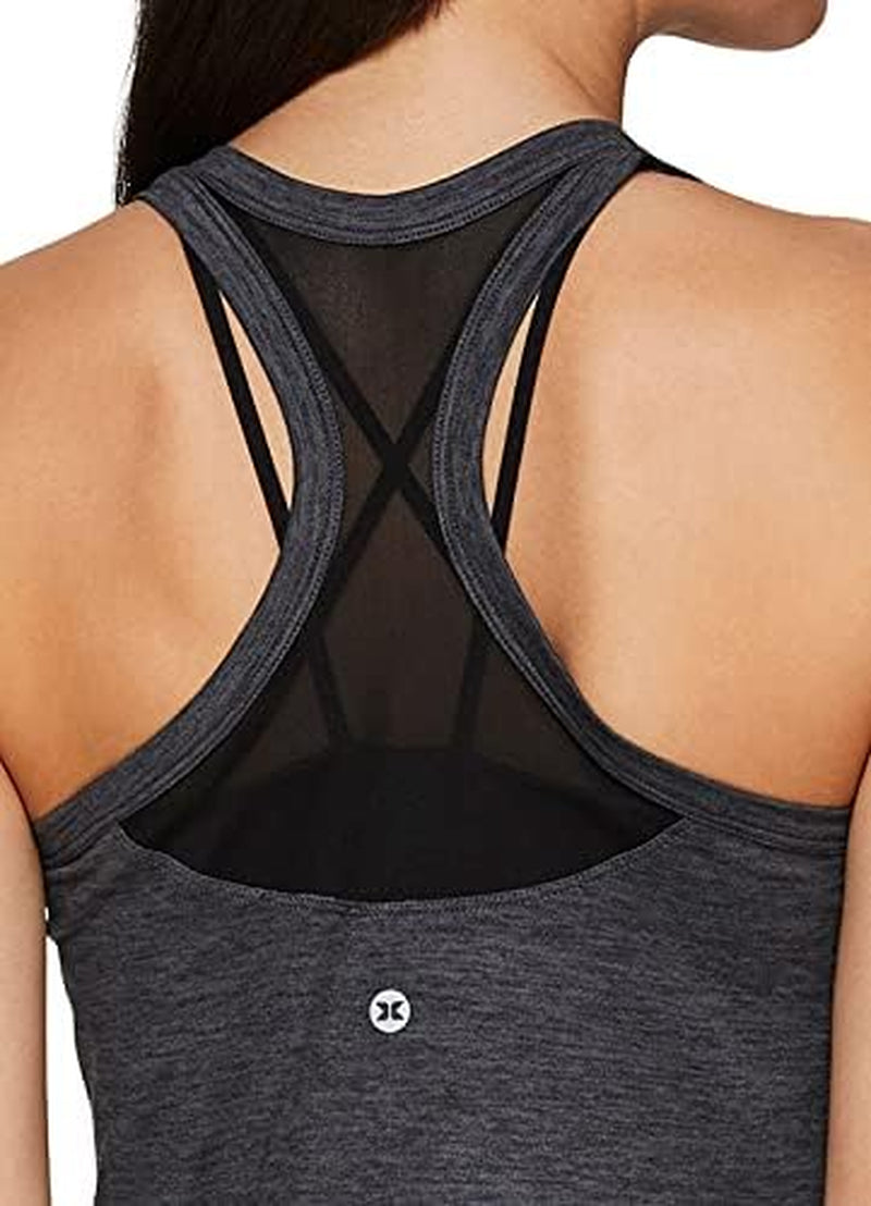 RBX active women's sleeveless running and yoga tank top with mesh ventilation for breathability and workout comfort.