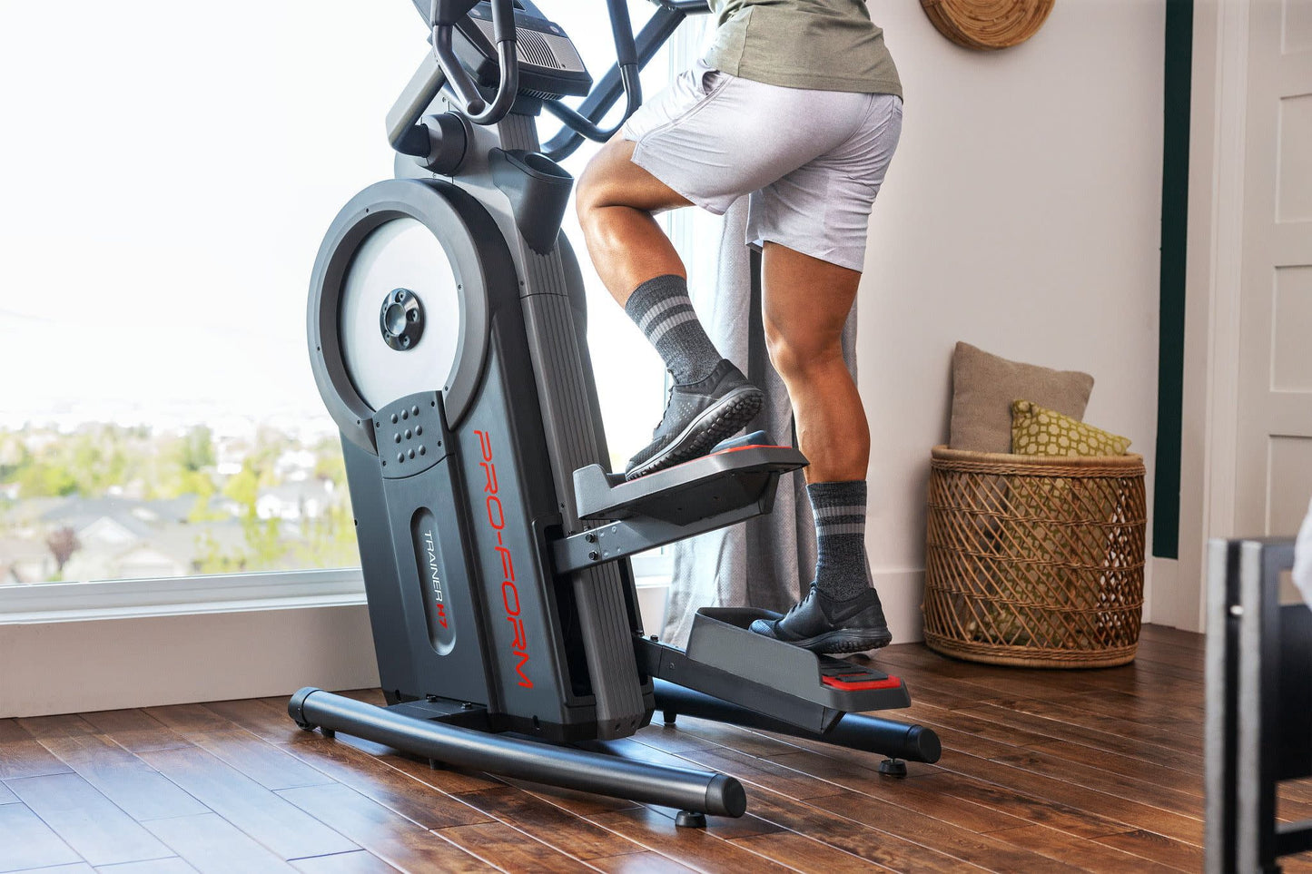 Fitness Essentials Trainer H7 iFit-enabled elliptical with 7-inch touchscreen display and built-in fan for workout comfort.