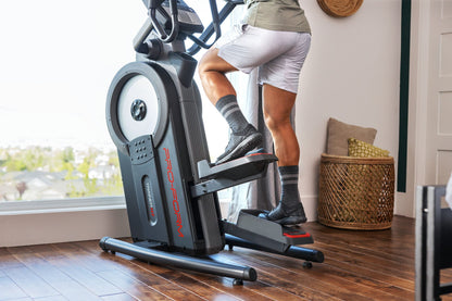 Fitness Essentials Trainer H7 iFit-enabled elliptical with 7-inch touchscreen display and built-in fan for workout comfort.