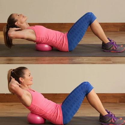 Pink 25cm Fitness Essentials yoga ball for Pilates, core training, and home workouts, shown on a workout mat.