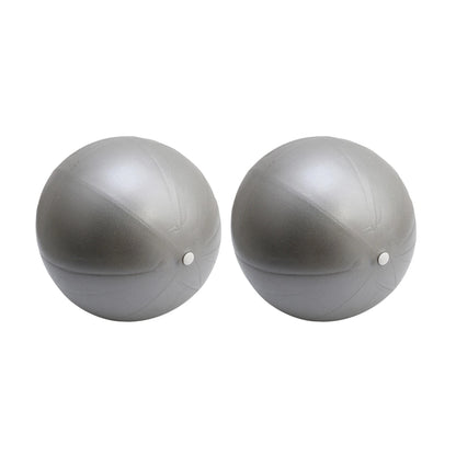Pink 25cm Fitness Essentials yoga ball for Pilates, core training, and home workouts, shown on a light background.