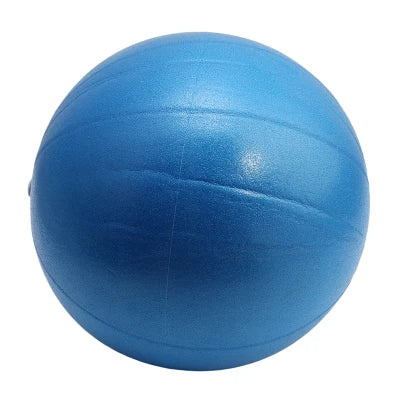Pink 25cm Fitness Essentials yoga ball used for Pilates, core training, and home workouts in a gym setting.