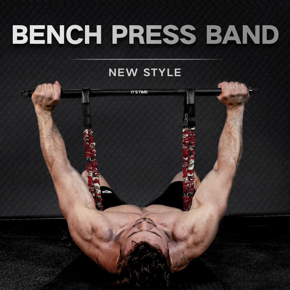 Red removable chest expander resistance band from Fitness Essentials, used for bench press and upper body workouts.