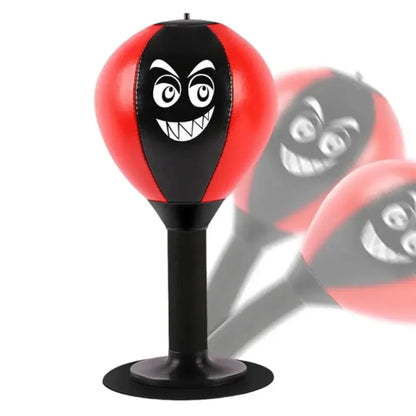 Red children's stress reliever punching bag toy with suction cup, desk boxing punch ball for tension relief by Fitness Essentials.