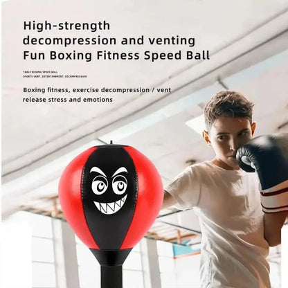 Red stress reliever punching bag toy with suction cup, designed for kids to reduce tension and promote fun desk boxing activities.