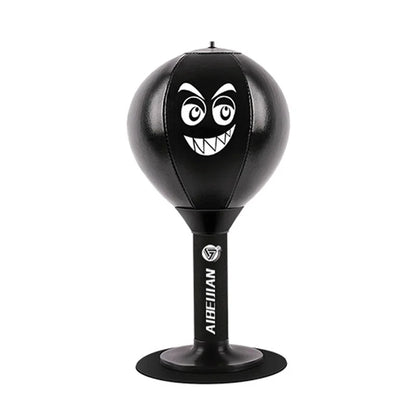 Red children's stress reliever punching bag with suction cup, desk boxing ball for tension relief by Fitness Essentials.
