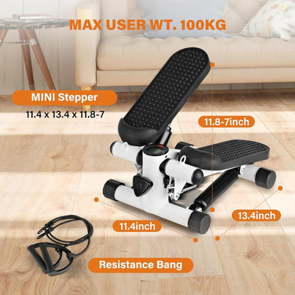 White mini stepper exercise machine with resistance bands and LCD display for home cardio workouts by Fitness Essentials.