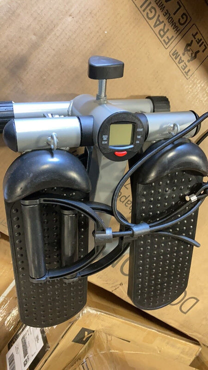 White mini stepper exercise machine with resistance bands and LCD display for home cardio workouts by Fitness Essentials.
