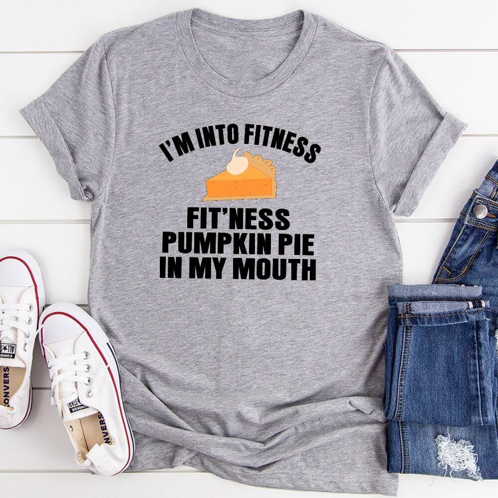 fitness pumpkin pie graphic t-shirt in athletic heather color with humorous text design