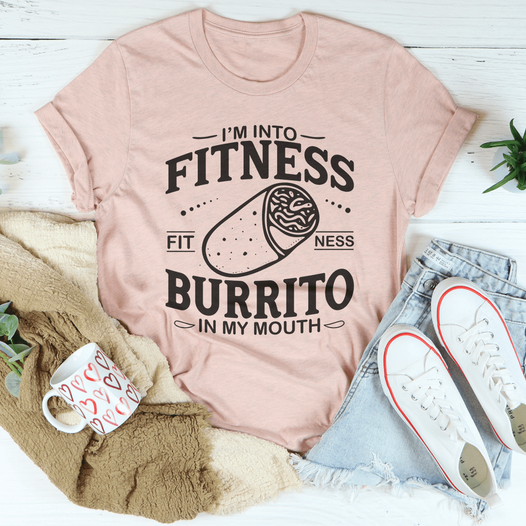 I'm Into Fitness Burrito In My Mouth Tee in Heather Prism Peach, a fitness burrito graphic t-shirt on a stylish flat lay.