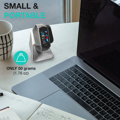 KoreHealth KORE 2.0 Elite smartwatch charging stand made of aluminum, non-slip design, holds fitness tracker and heart rate monitor.
