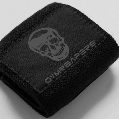 Black gym wrist wraps by My Store 2, showing adjustable straps and reinforced stitching for wrist support during workouts.