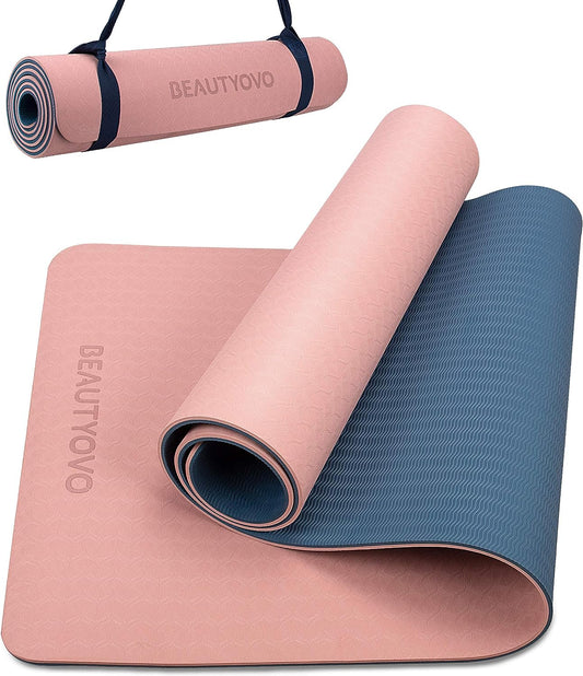 Cherry pink and navy blue double-sided TPE yoga mat with strap, 1/3 inch thick, non-slip, suitable for yoga, Pilates, and floor exercises.