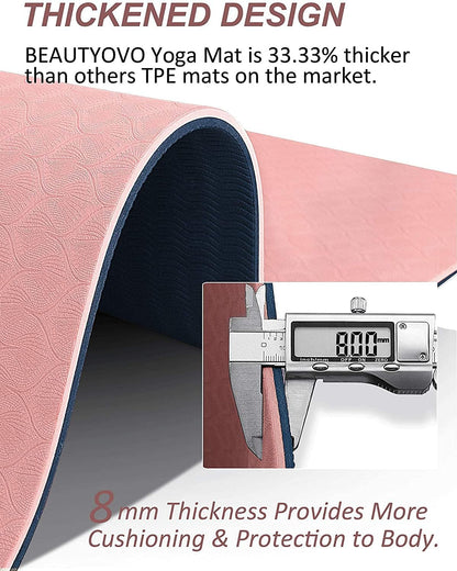 Cherry pink and navy blue TPE yoga mat with strap, extra thick, double-sided non-slip surface, ideal for yoga, Pilates, and floor exercises.