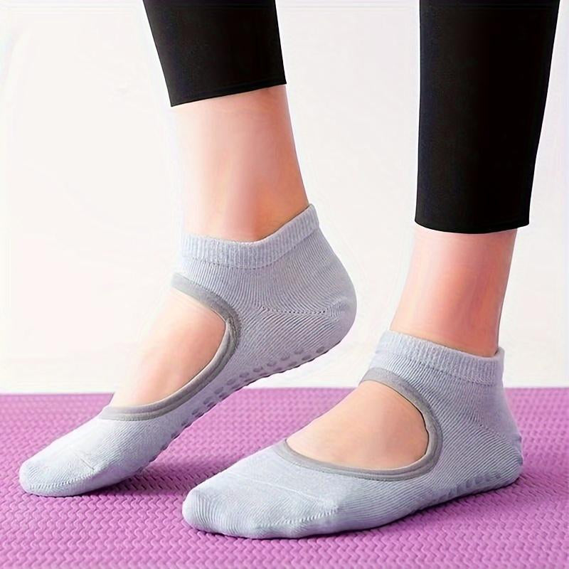 Women's comfortable non-slip yoga socks in mixed colors, designed for stability and flexibility during yoga practice.