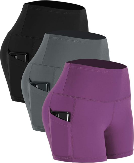 Pack of three women's high waist athletic shorts in grey, black, and purple with deep pockets for yoga, fitness, and running.
