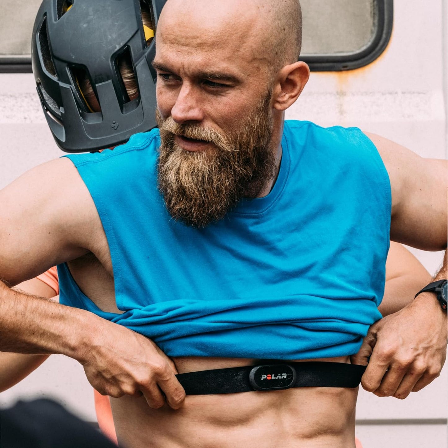Black POLAR H10 heart rate monitor chest strap in size M-XXL, waterproof design for accurate heart rate tracking during exercise.