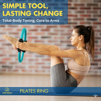 Blue ProBody Pilates Fitness Circle, 14-inch Pilates ring used for toning inner thighs, arms, and core muscles.