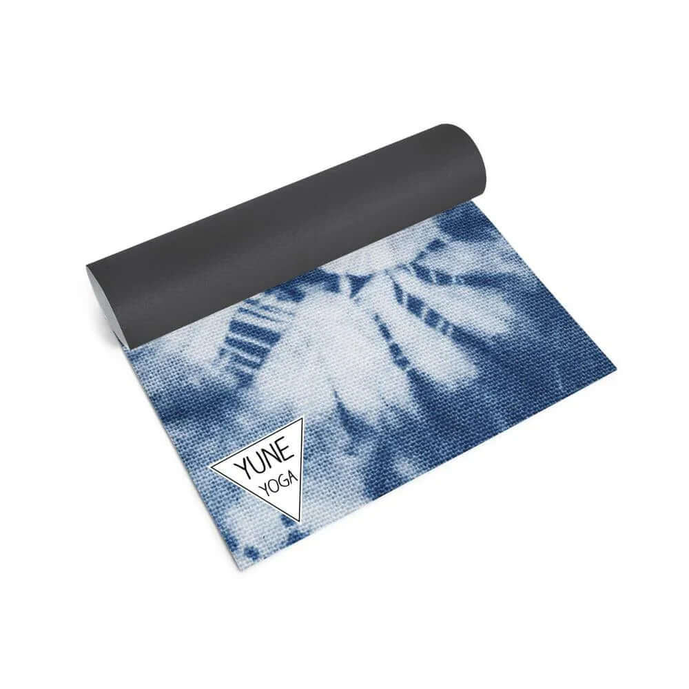 Ataraxy Yoga Mat in blue tie-dye design highlighting non-slip yoga mat with cushioned support for workouts.
